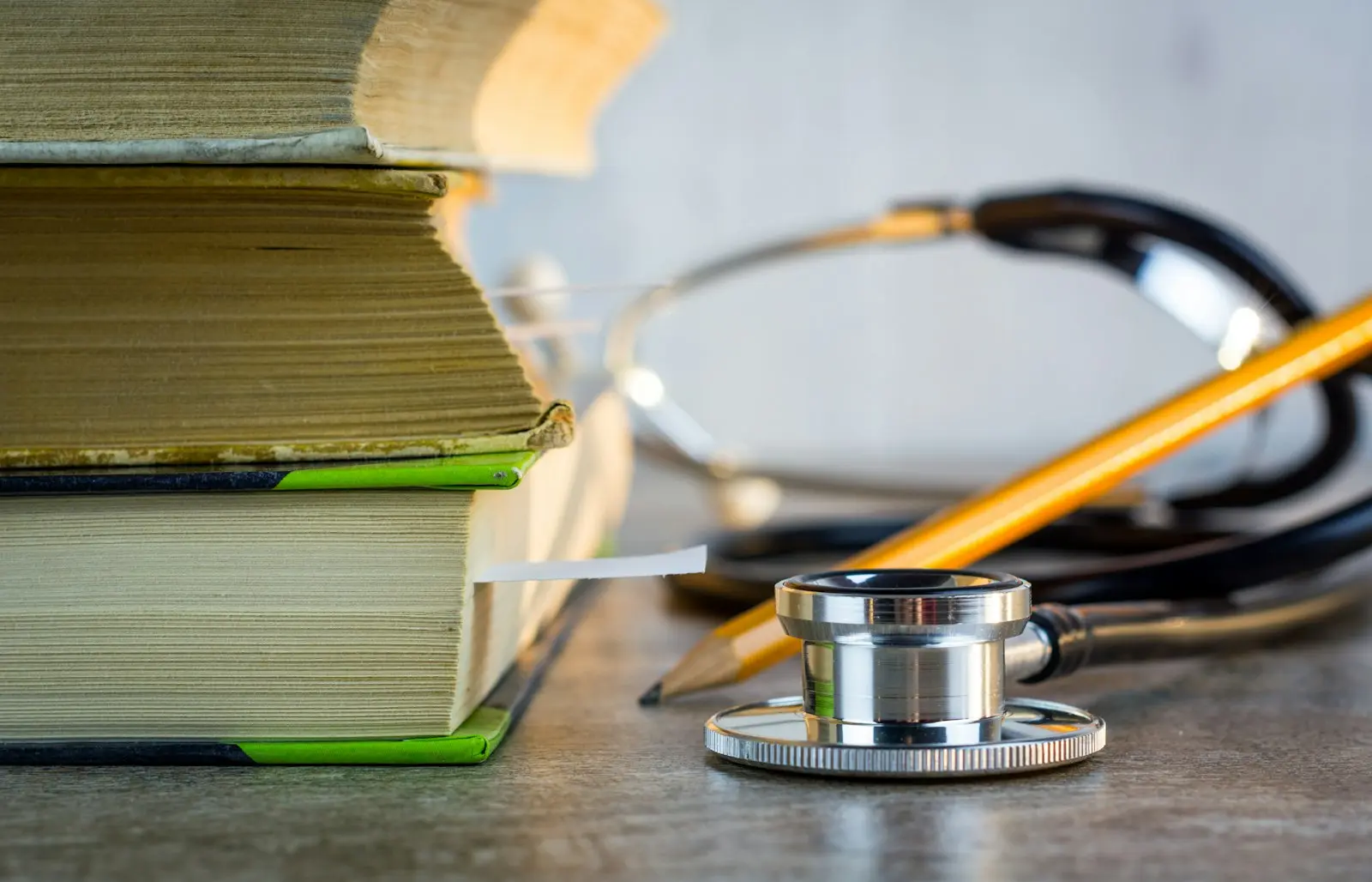 Clinical workspace with stethoscope and registration documents